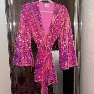 Buddy love, pink sequin wrap dress.